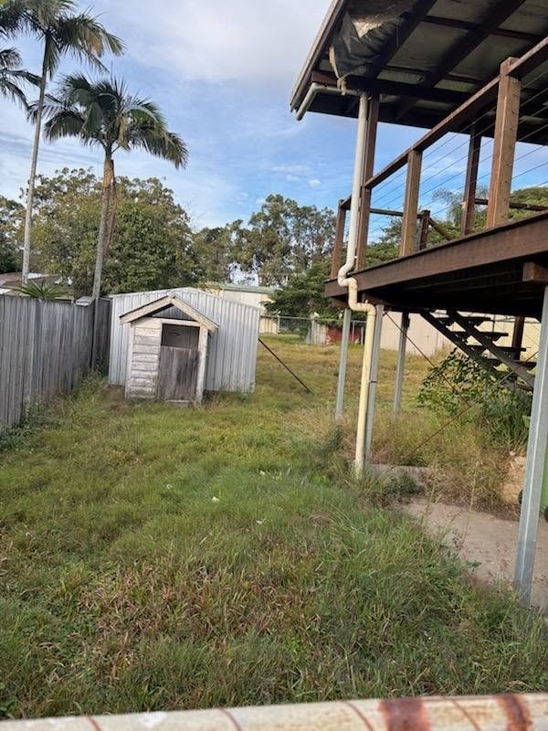 Neglected garden before maintenance — Brisbane